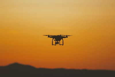 Unmanned aerial vehicle (uav) silhouette photography
